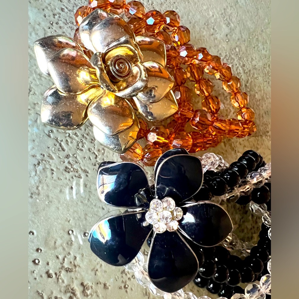 (2) beaded bracelets with flower brooch and crystal accents
